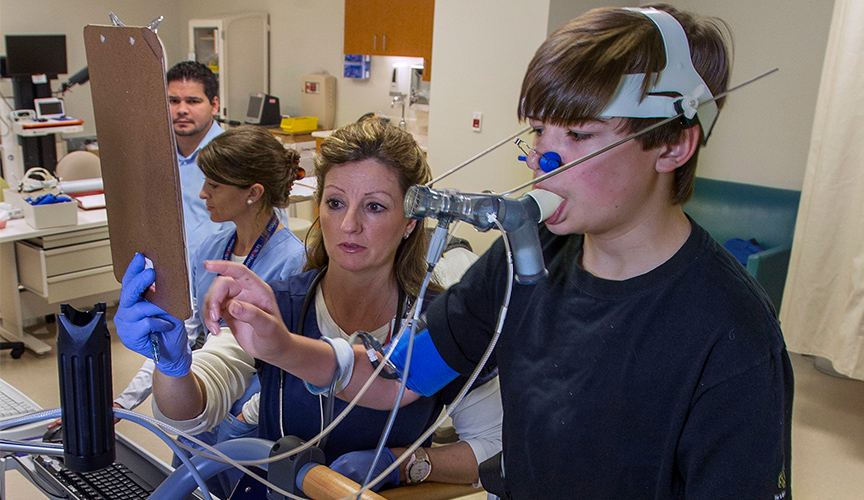 A patient undergoing a cardiopulmonary exercise stress test.